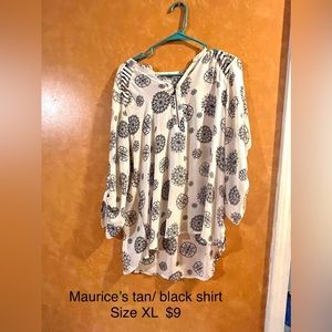Maurices top tan with black details. Zipper neck line and slits in sleeves.